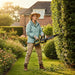 Woman trimming garden hedges with MiniSawPro M12 cordless mini chainsaw – lightweight pruning saw for home use