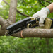 M9 mini lithium chainsaw sharp chain close-up cutting tree branch – compact cordless one-hand pruning saw precision cuti-minisawpro